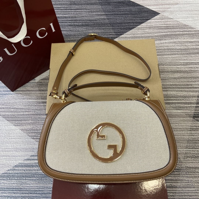 G*u*i top handle bags